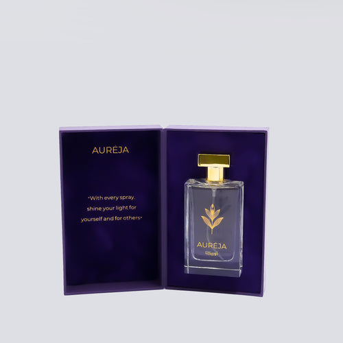 Aureja perfume bottle with purple packaging on a light gray background