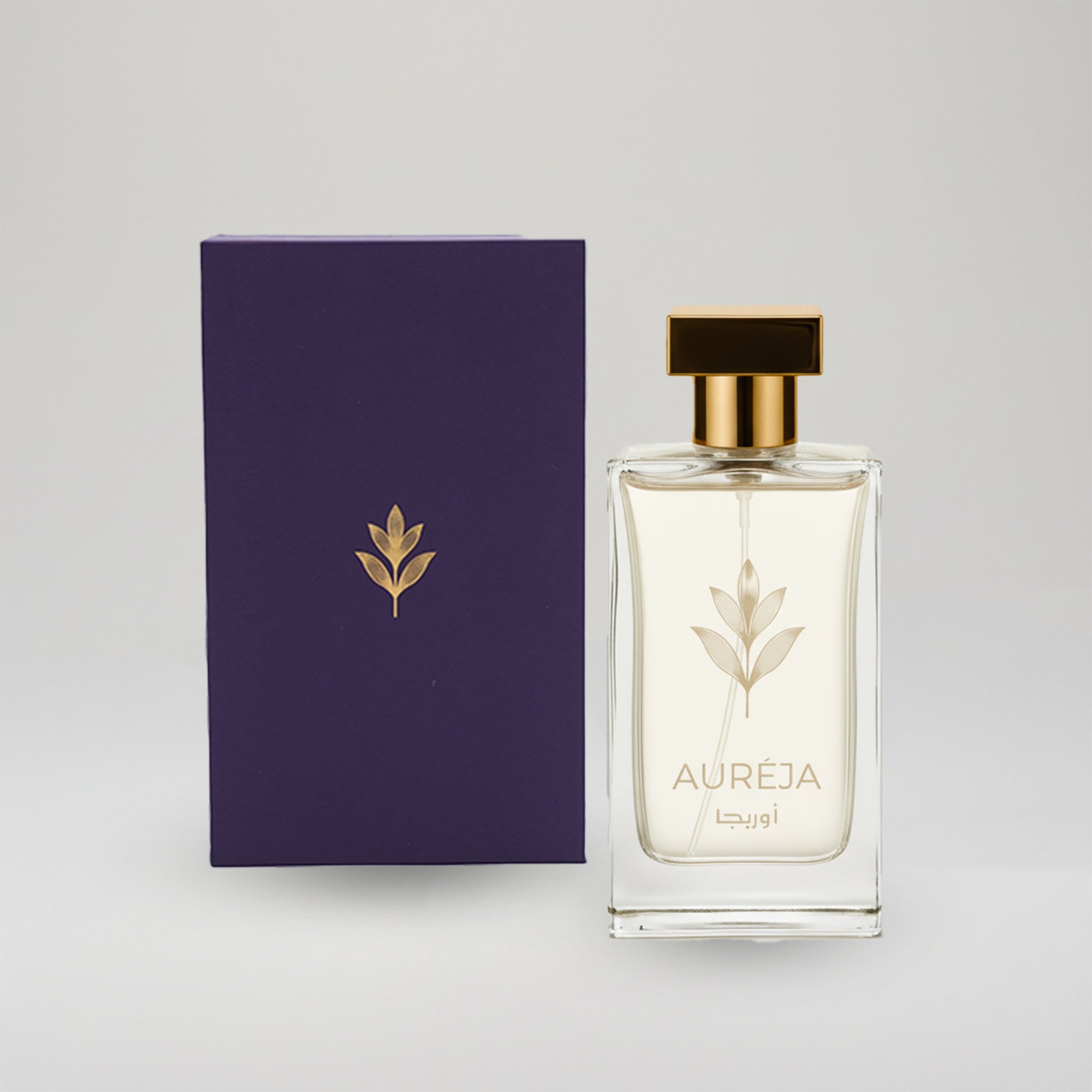 Perfume bottle and packaging with 'Aureja' branding on a light gray background