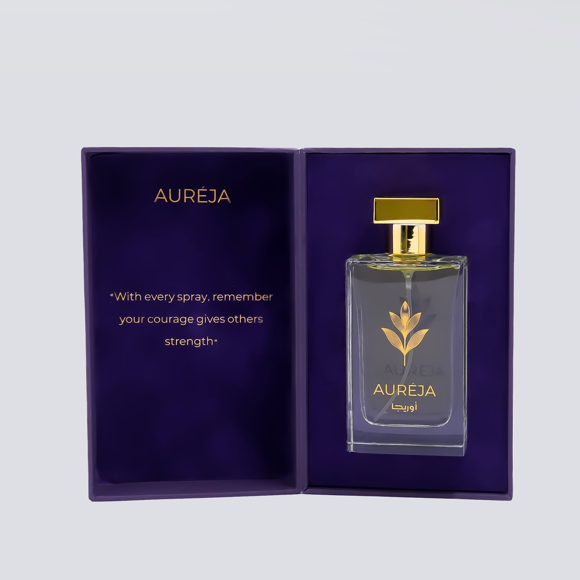 Aureja perfume bottle with gold cap and leaf design on a purple box with text.
