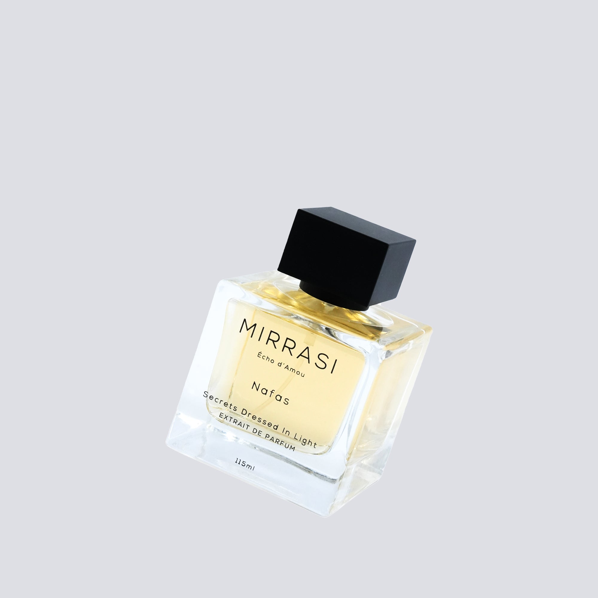 Mirrasi perfume bottle on a light gray background